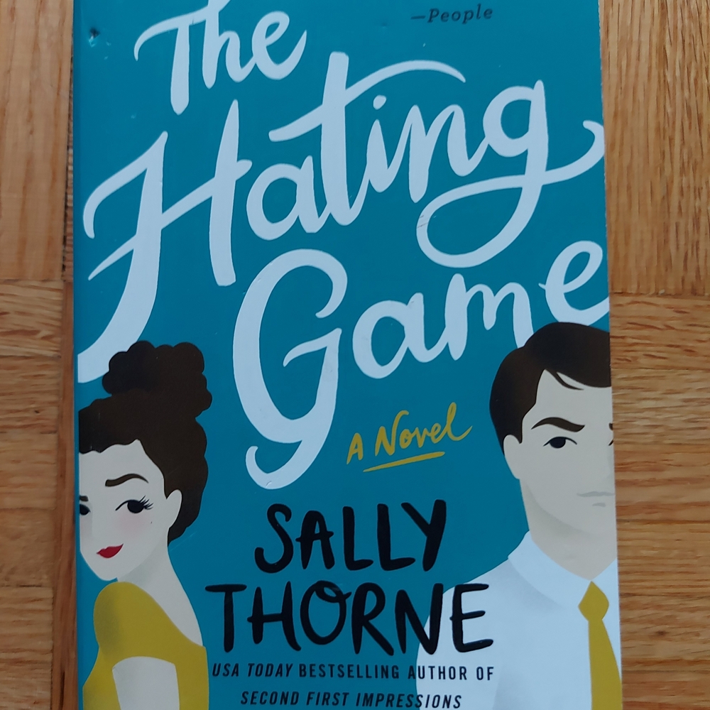 The Hating Game Novel by - Blue Cover